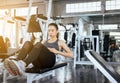 Young asian woman doing situp or crunches in gym,Female exercise muscular her stomach Royalty Free Stock Photo