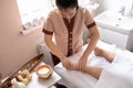 Young Asian woman doing Vietnamese massage