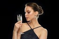 Young asian woman drinking champagne at party Royalty Free Stock Photo