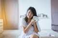 Young asian woman drying hair with towel,Female drying her long hair with dryer Royalty Free Stock Photo