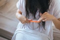 Young asian woman drying hair with towel,Female drying her long hair with comb Royalty Free Stock Photo