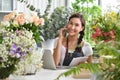 Young Asian woman entrepreneur/shop owner/ florist of a small flower shop business Royalty Free Stock Photo