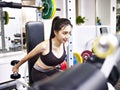 Young asian woman exercising working out in gym