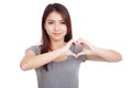 Young Asian woman gesturing heart hand sign Royalty Free Stock Photo