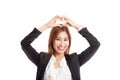 Young Asian woman gesturing heart hand sign Royalty Free Stock Photo