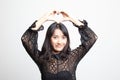 Young Asian woman gesturing  heart hand sign Royalty Free Stock Photo