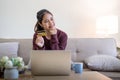 Young Asian woman hands holding credit card and using laptop for internet purchase. Online shopping, Online payment at Royalty Free Stock Photo