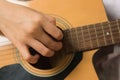 Asian woman hands touching guitar chords Royalty Free Stock Photo