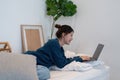 Young asian woman having conversation chatting while using laptop at house. Work at home, Video conference, Online Royalty Free Stock Photo