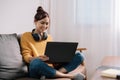 Young asian woman having conversation chatting while using laptop at house. Work at home, Video conference, Online Royalty Free Stock Photo