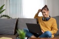 Young asian woman having conversation chatting while using laptop at house. Work at home, Video conference, Online Royalty Free Stock Photo