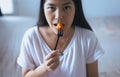 Young asian woman having fresh fruits papaya slices,Concept healthy food Royalty Free Stock Photo