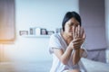 Young asian woman having a wrist or hand pain,Female feeling exhausted and painful Royalty Free Stock Photo