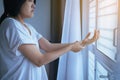 Young asian woman having a wrist pain,Female feeling exhausted and painful Royalty Free Stock Photo