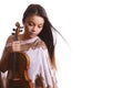 a young asian woman holding a violin instrument Royalty Free Stock Photo