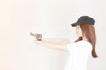 Young asian Woman holding the gun Royalty Free Stock Photo