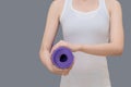 Young asian woman with holding her yoga mat Royalty Free Stock Photo