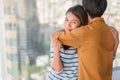 Young asian woman hug her friend for encouragement, She smile behind friend, Selective focus, PTSD Mental health concept Royalty Free Stock Photo