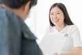 Young asian woman interview. Hiring employee concept. Royalty Free Stock Photo