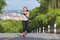 Young asian woman jogging in park smiling happy running Royalty Free Stock Photo