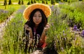 Young Asian Woman Lies In The Lavender Flower Field Royalty Free Stock Photo