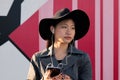 Young asian woman listening music from her phone Royalty Free Stock Photo