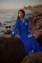 Young asian woman in long blue dress Royalty Free Stock Photo