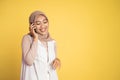 happy asian woman making a call using a cell phone Royalty Free Stock Photo