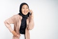 happy asian woman making a call using a cell phone Royalty Free Stock Photo