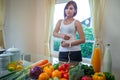 Young asian woman measuring Royalty Free Stock Photo