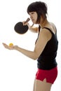 Young Asian woman palying ping-pong Royalty Free Stock Photo