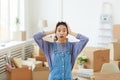 Young Asian Woman Panicking when Moving Out Royalty Free Stock Photo