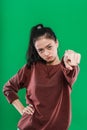 young Asian woman pointing at the camera while expression pissed off the face Royalty Free Stock Photo