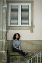 Young asian woman is posing for photo shoot in the street, Porto