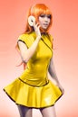 Young asian woman posing in yellow dress Royalty Free Stock Photo