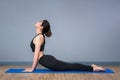 Young asian woman practicing yoga pose Royalty Free Stock Photo