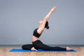 Young asian woman practicing yoga pose Royalty Free Stock Photo