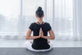 Young Asian woman practicing yoga