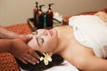 Young asian woman receiving head massage at beauty spa Royalty Free Stock Photo