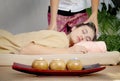 Asian woman receiving a head Thai massage Royalty Free Stock Photo