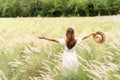 Young asian woman relaxing and enjoying in the flower field while traveling Royalty Free Stock Photo