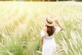 Young asian woman relaxing and enjoying in the flower field while traveling Royalty Free Stock Photo