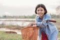 young asian woman riding bicycle at park Royalty Free Stock Photo