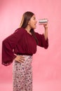 Young Asian woman shout with tin can phone Royalty Free Stock Photo