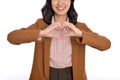 Young Asian woman showing hand heart sign isolated on white background, Spreading love and happiness concept