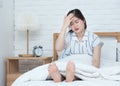 Young asian woman sleeping on the bed in the early morning and late work time or study