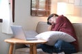 young asian woman sleeping break time or off line mode after using laptop relax sitting on couch or sofa, people Royalty Free Stock Photo