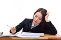 Young Asian woman sleeping on the desk. Royalty Free Stock Photo