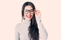 Young Asian woman with smiley face wearing glasses isolated on w Royalty Free Stock Photo