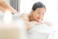 Young Asian woman  in spa salon getting massage. Royalty Free Stock Photo